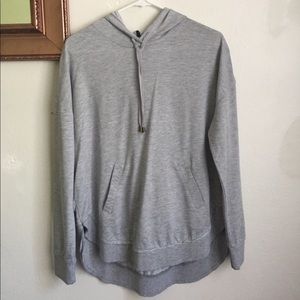 Lightweight long sleeved and hooded pull over